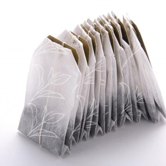 tea bags on a white surface